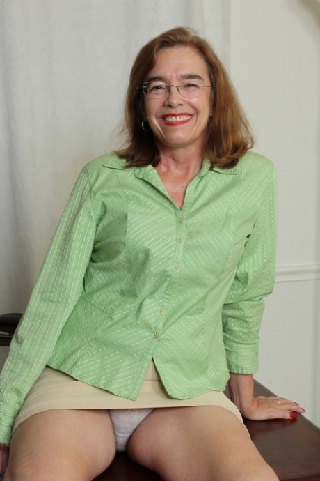 Mature American female pleasures her hairy bush with a vibrator 13912067