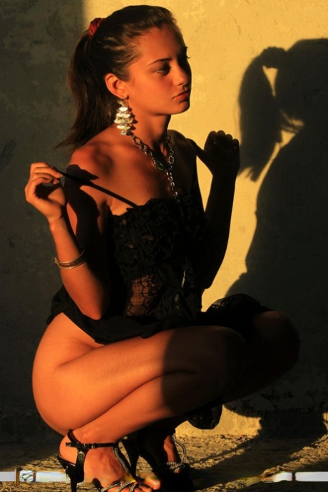 Sexy teen Sima B finger spreads her tight pussy against a concrete wall 32684806