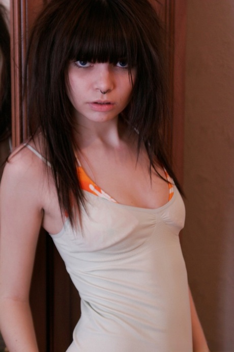 Barely legal hottie Kaira 18 uncovers her small tits while getting bare naked 32483558
