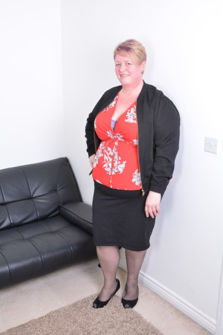 Older British fatty licks a nipples as she disrobes to suck on a dildo 60282318