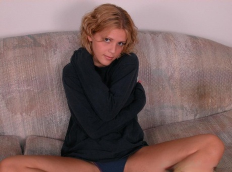 Barefoot teen girl pulls down her underwear to pet her pussy 73140402