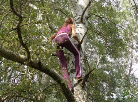 Sweet blonde teen gets totally naked after climbing a birch tree 41656768