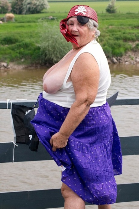 Fat British granny exposes herself on a bridge while sporting pirate attire 35689117