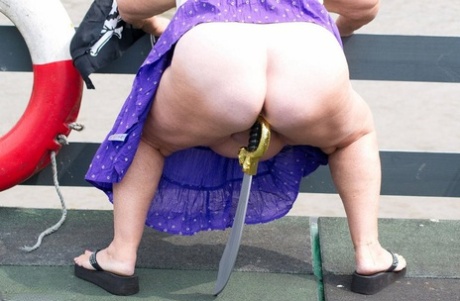Fat British granny exposes herself on a bridge while sporting pirate attire 35689117