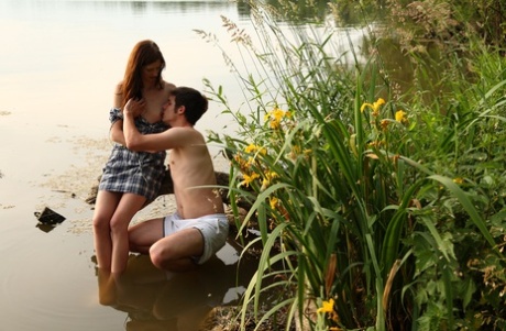 Young couple wade into a body of water before getting naked to fuck 90490348