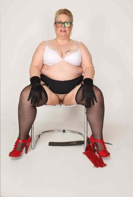 Obese UK blonde Lexie Cummings displays her pierced twat in gloves and nylons 45157764