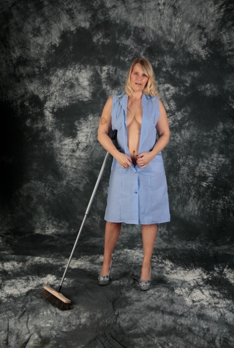 Blonde cleaning lady Sweet Susi exposes herself while pushing a broom 99305683
