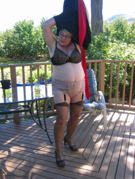 Amateur grandmother Girdle Goddess smokes before getting naked in nylons 89380901