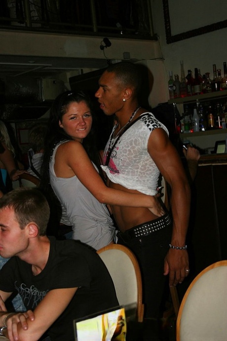 Brunette amateur Bella strips to her bra and underwear while inside a club 43147704