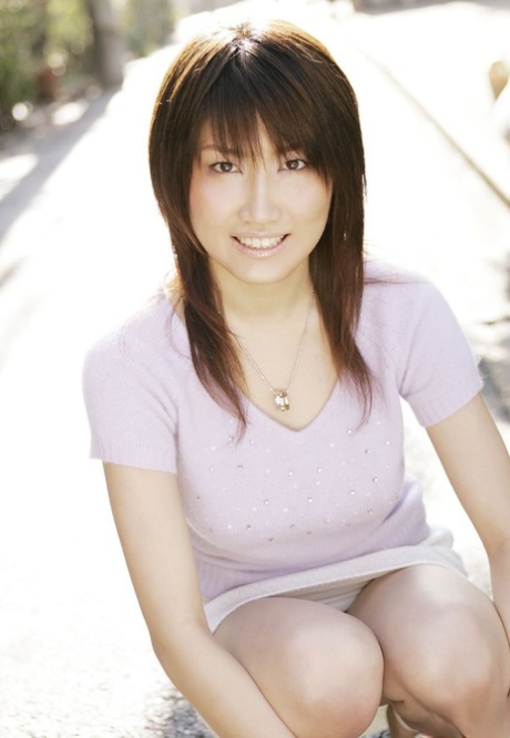 Japanese student Nayuka Minei uncovers her great tits while getting naked 41799857