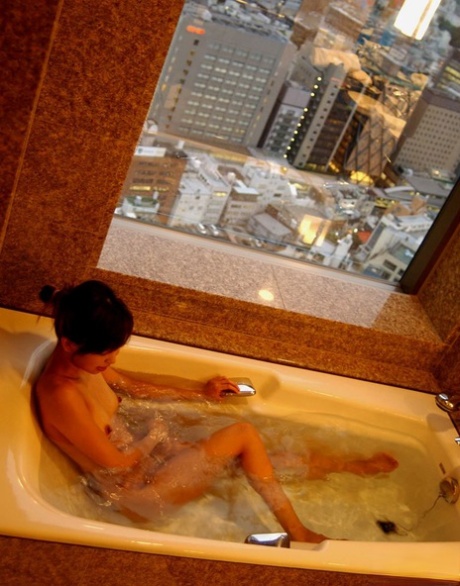 Young Japanese girl Sunao removes a skirt before taking a bath 52763646