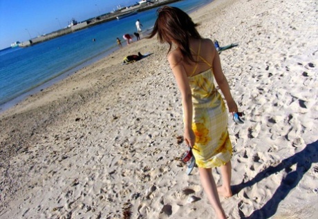 Cute Japanese girl Yua Aida unveils her nice tits after a day at the beach 90217471
