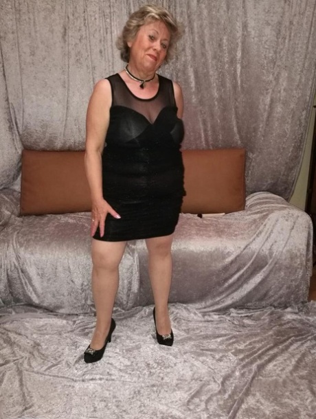 Horny granny Caro hikes up her dress to masturbate in nylons and heels 44847441