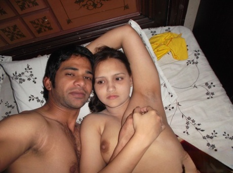 Indian girl gets naked on a bed before being joined by her lover 17826641