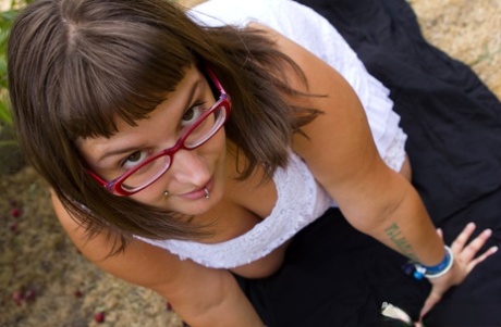 Thick amateur Betty H unveils great breasts as she disrobes outdoors 70096411