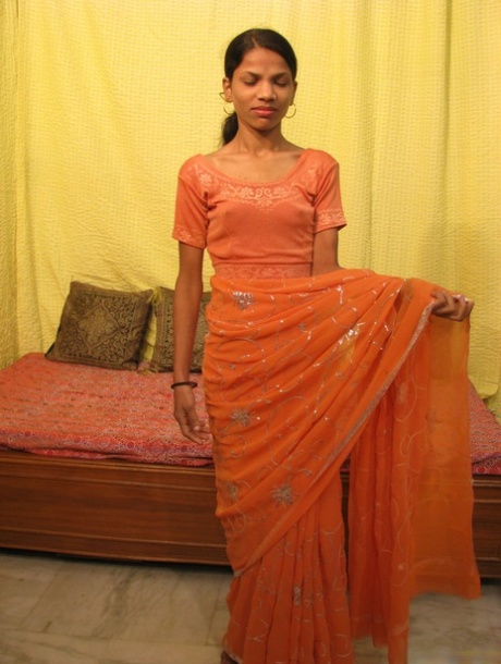 Skinny Indian woman has her pink pussy spread after getting totally naked 96611071
