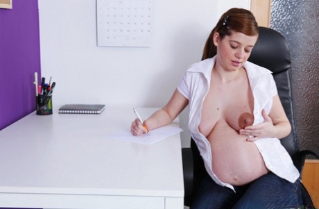 Pregnant girl gets totally naked before masturbating on a desk chair 30254862