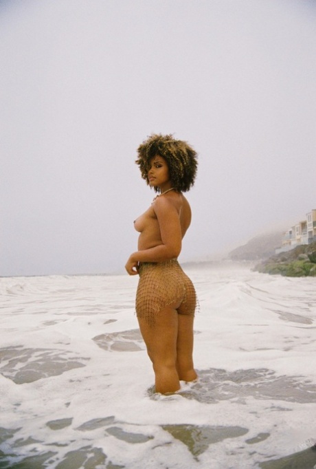 Hot ebony chick Gillian Chan strikes great nude poses for a Playboy shoot 12607673