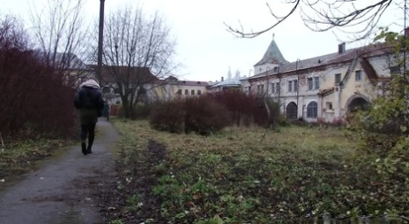 Caucasian girl Lera pulls down her hose on a chilly day for a piss by a tree 92709082