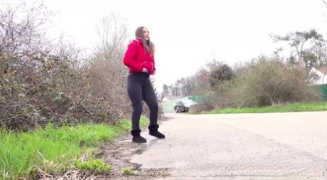 Caucasian teen Nicolette Noir takes a badly needed piss on a paved road 45103530