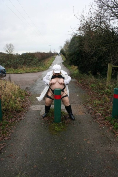 Fat British woman Lexie Cummings exposes herself on a pedestrian bridge 24207521