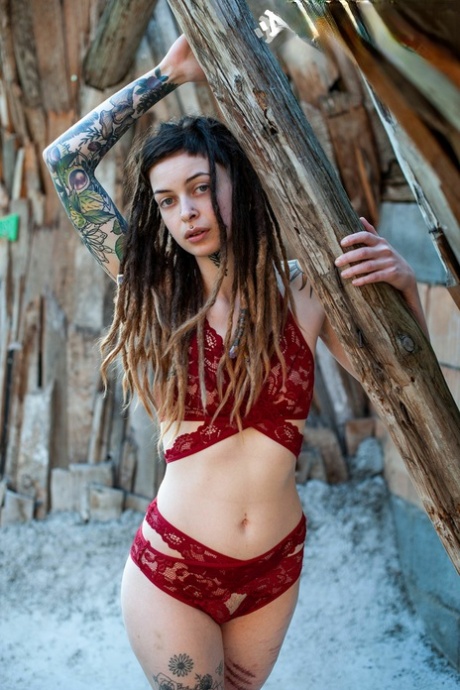 Tattooed female Cutz sports dreadlocks while showing her tiny tits 41593381