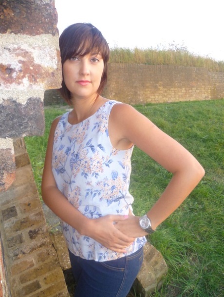 Girl next-door type Roxy shows off her new watch while outside her home 41810543