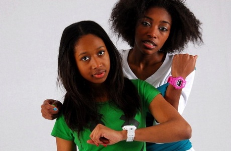 Lesbian sistas Deborah and Naomie model A Bathing Ape watches while clothed 97916714