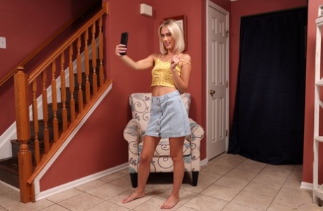 Young blonde Sky Pierce takes some shots before pissing on a floor in the nude 14444712