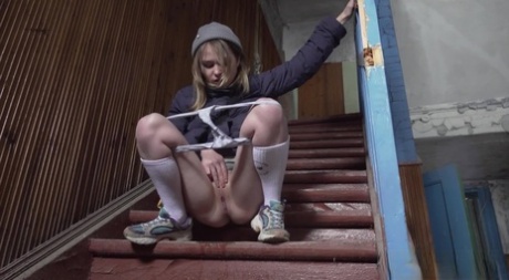 White girl Nastya squats on a flight of stairs while taking a piss 94381827