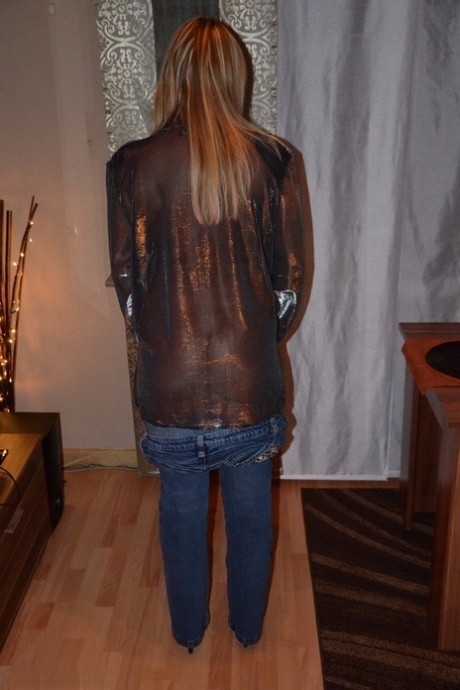 Middle-aged blonde Sweet Susi unbuttons a sheer blouse while disrobing 32111028