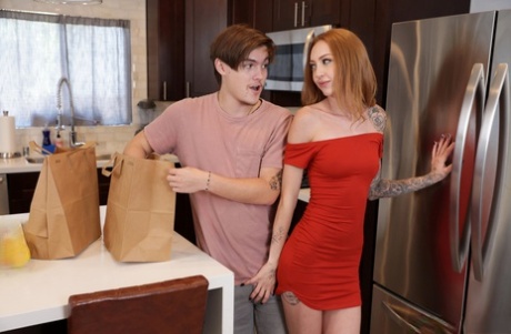 Natural redhead Kendra Cole has sex with her stepbrother atop a bed 42724998
