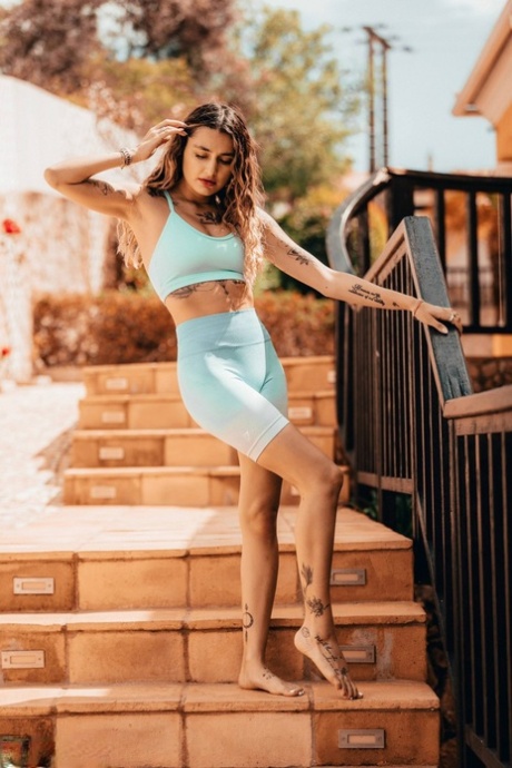 Sexy girl Seline P frees her tattooed body from athletic apparel 61591620