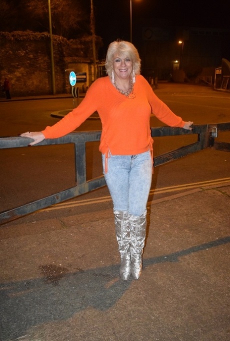 Older blonde Dimonty gets naked on a chair while wearing over the knee boots 23148648