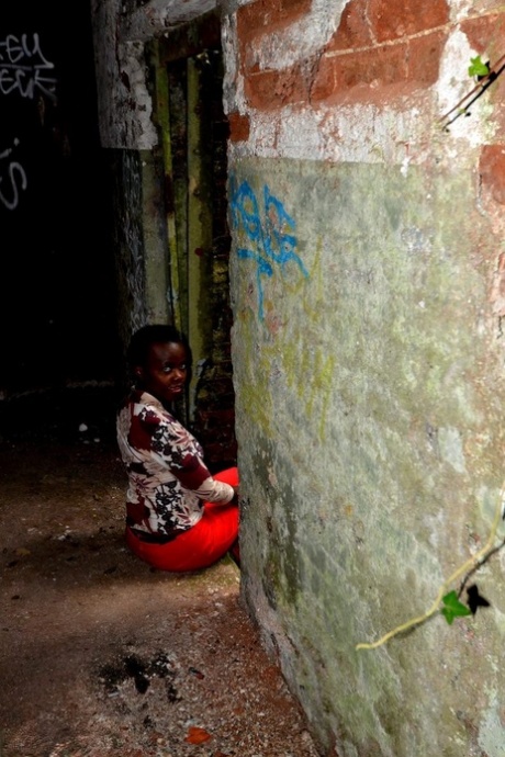 Ebony amateur shows her tits and ass inside an abandoned building 19477412