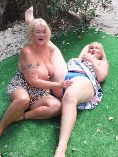 Older blonde fatty Melody and her lesbian lover fool around in a backyard