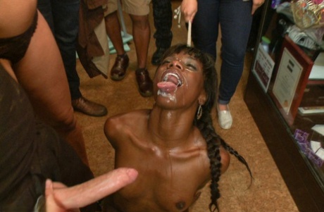 Submissive black girl is humiliated in public before a nasty gangbang 30940906
