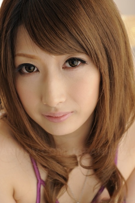 Japanese girl Keiko Shinohara gets totally naked on top of a bed 19723711