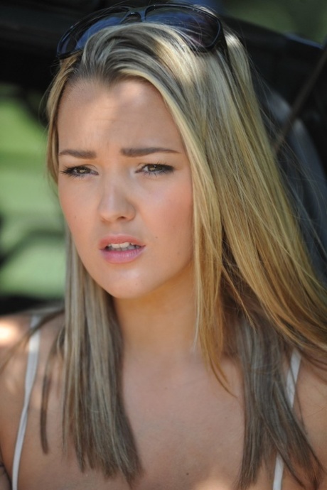 Big titted blonde Jodie Gasson strips naked to don her blue bikini 74567623