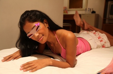 Petite Asian amateur Daisy engages in hardcore POV sex on a bed 53763366