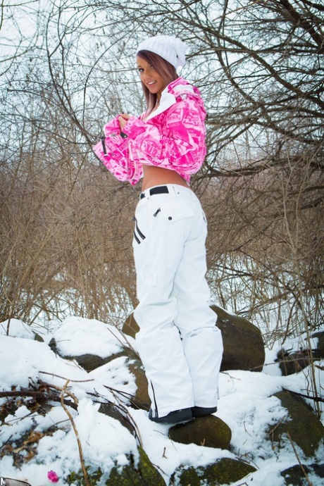 Amateur model Nikki Sims strips to a thong and toque on snow covered ground 62697662