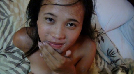 Cute Filipina amateur Ladylyne wipes sperm from her chin after POV sex 23481363