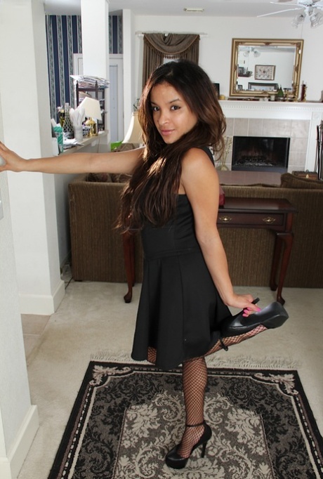 Brunette milf Viviann Wood is taking off her sexy black dress 71086253