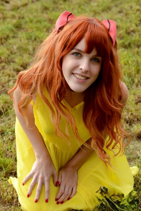Amarna Miller poses in a beautiful yellow dress while outside 97879882