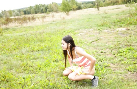 Barely legal teen hottie flashing perfect big natural tits outdoors 66144501