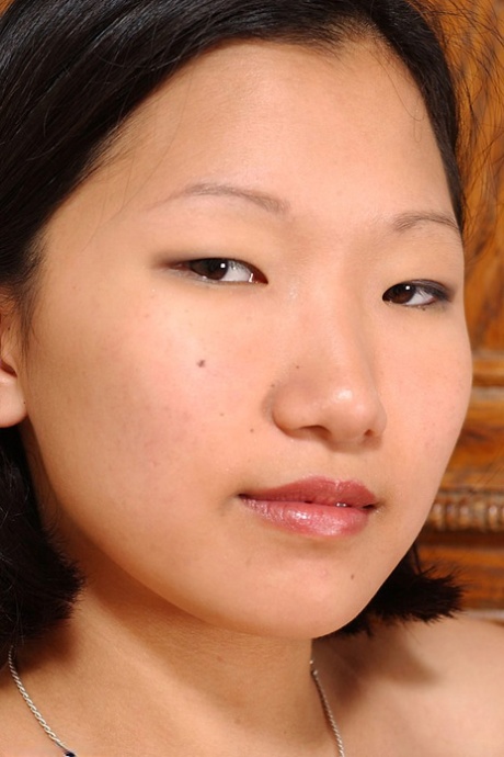 Japanese teen Maxine unveiling big all natural tits in pleated skirt 75610490