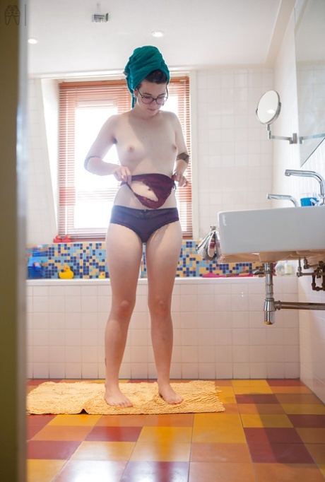 Amateur girl Emilia filmed on hidden cam dressing her naked body after a bath 18538976