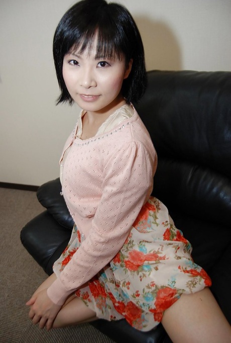 Asian babe Minori Nagakawa stripping down and exposing her hairy cunt 23645854