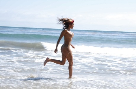 Frisky latina Anita Toro exposing her gorgeous oiled up body on the beach 98436341